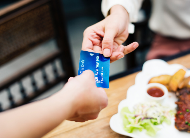 Someone paying with a credit card