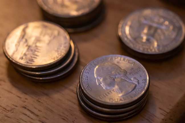 Image of quarters staked next to each other.