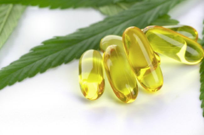 cannabis captures next to weed leaves