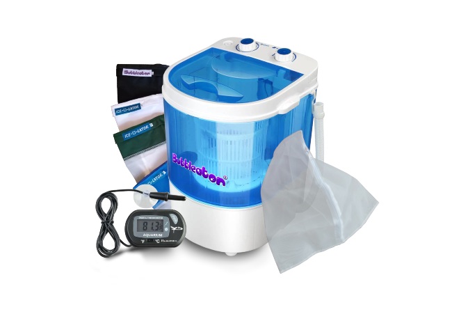 A blue machine with different mesh bags beside it.