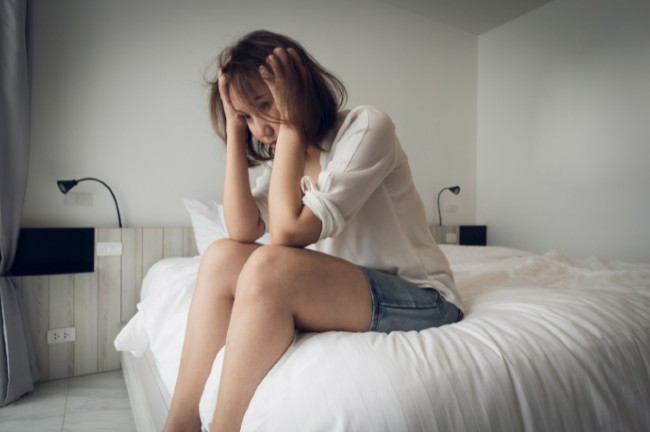 Someone experiencing anxiety after getting too high