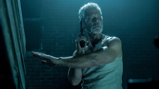 A man with a gun from the movie don't breathe