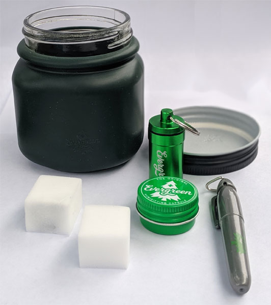 Evergreen jar, keychain, sponges, and marker. 